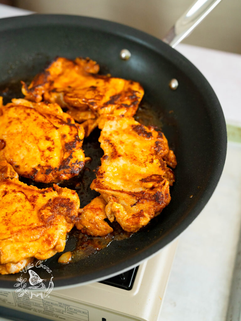 Pan-seared chicken ready to come off the pan.